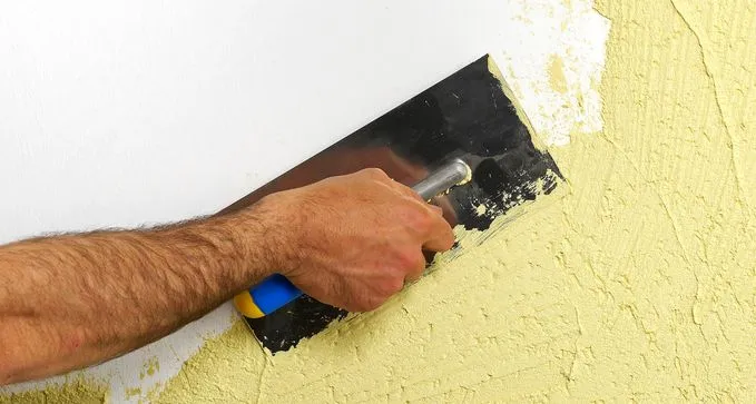 revestir fachada con enfoscado de cemento a bajo coste en Caspe